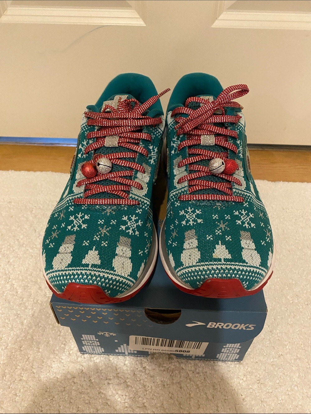 Brooks Teal Knit Running Shoes with Red Accents and Holiday Pattern